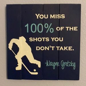 Wall decor with Wayne Gretzky quote